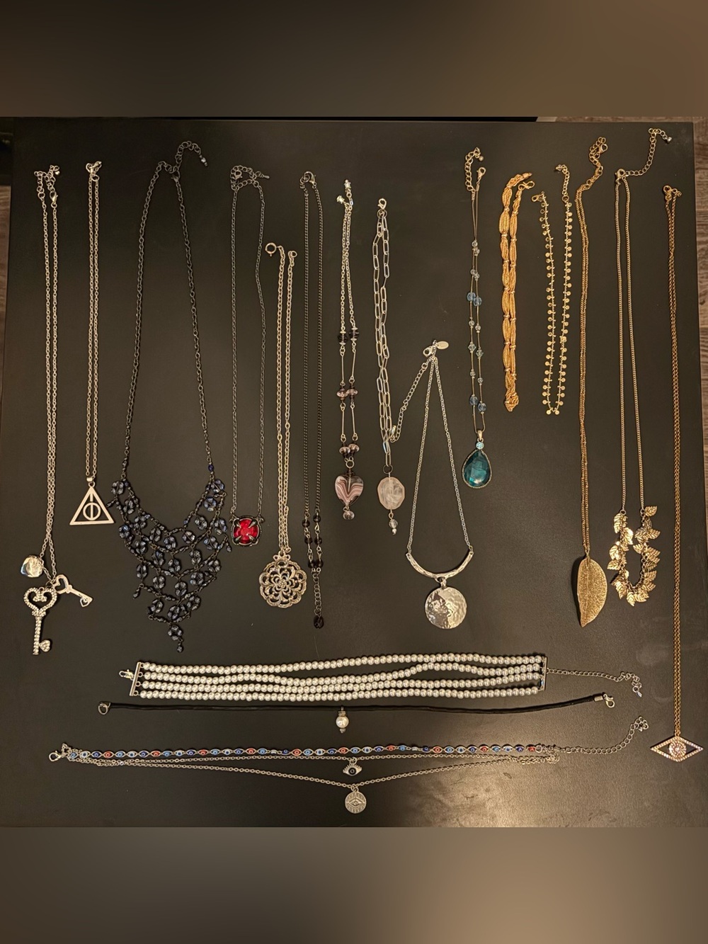 Assortment of Gold and Silver Costume Jewelry Necklaces
